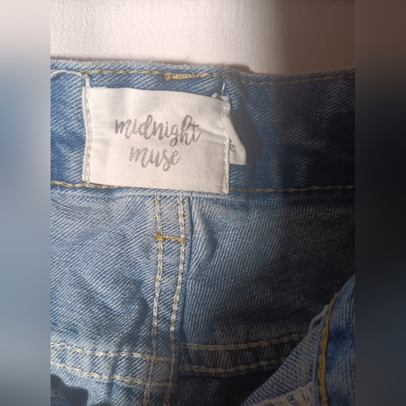 Women's Distressed Blue Jeans with Studded Detail - Picture 3 of 8